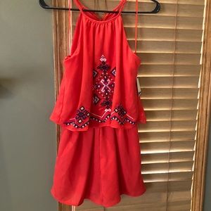 Orange romper. Size XS.